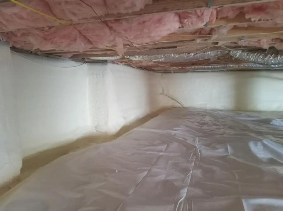Crawl space encapsulation with closed-cell spray foam for Commercial Roof Restoration in Dyersburg